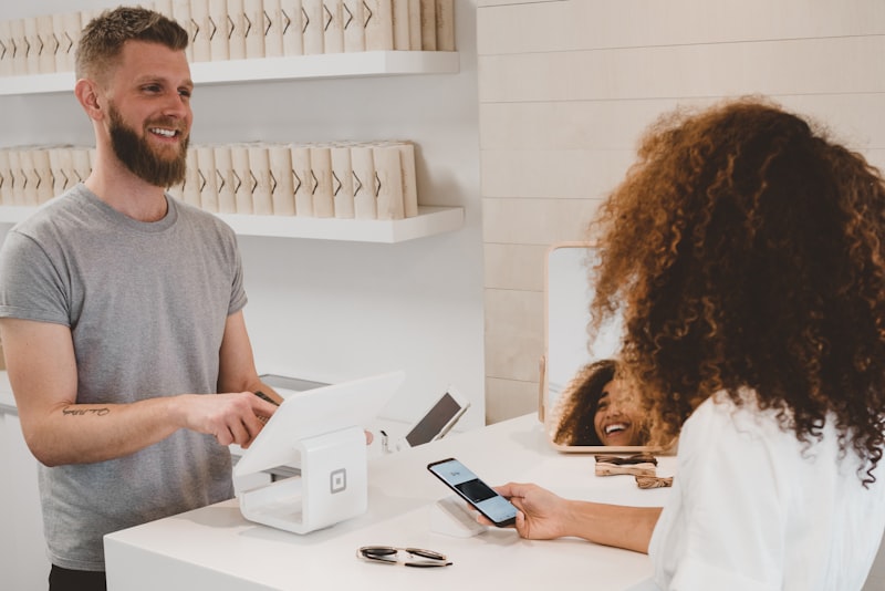 Customer completing a purchase at checkout